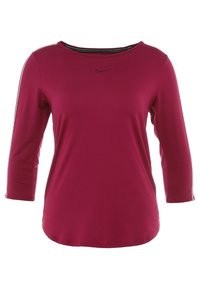 Vinsgrön långärmad träningsoverdel med rund halsringning, har svart Nike-logotyp och vita sidränder. Tillverkad av mjukt, stretchigt material.