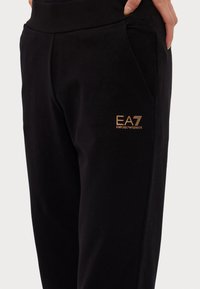 EA7 Emporio Armani TROUSER - Träningsbyxor - black