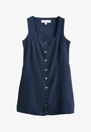 Bezrekawną sukienka z granatowego lnu z falistym przednim brzegiem i złotymi guzikami w kształcie serca wzdłuż środka.