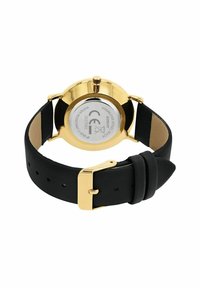 Gouden polshorloge met zwarte leren band, roestvrijstalen achterkant en gouden gesp, van de achterkant weergegeven met details over de waterbestendigheid.