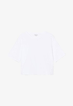 T-shirt blanc court avec des manches courtes, un col rond et des détails en dentelle sur les côtés. Fabriqué en tissu doux et lisse.