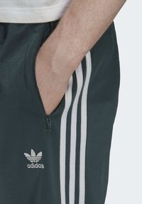 adidas Originals Teplákové kalhoty - dark green