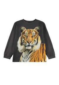 Pikendusega must särk, millel on detailne tiigri graafika, esitledes erksat oranži ja valget karvapatternit. Pehme kangastekstuuri.