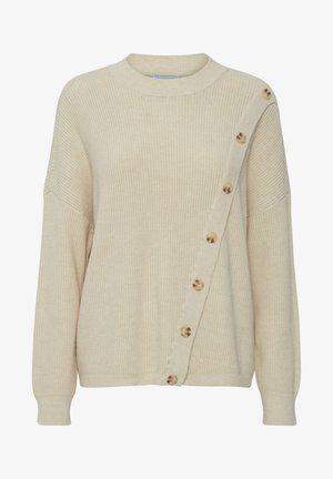 Beidz rievu džemperis ar augstu apkakli, pārāk lielu piegriezumu un diagonālu lielu pogu rindu vienā pusē. Mīksta tekstūra un ikdienišķs dizains.