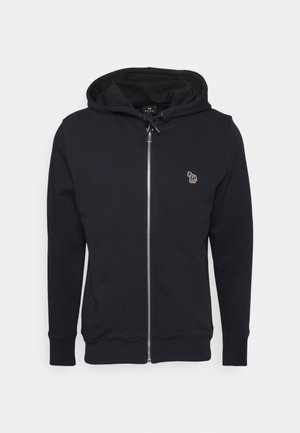 Black zip-up hoodie made of soft fabric, featuring a drawstring hood and a small embroidered design on the chest. Ribbed cuffs and hem.