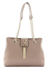 Brown textured leather handbag with chain strap, gold hardware, V-shaped accent, and a tassel detail hanging from the front clasp.