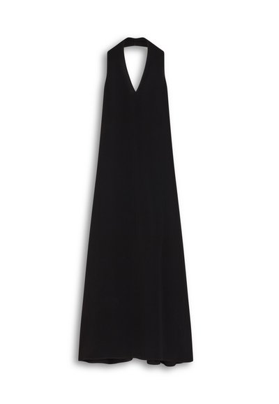 Long black halter dress with a deep V-neckline. Made of soft fabric, it features a flowing silhouette and a tied neck detail.