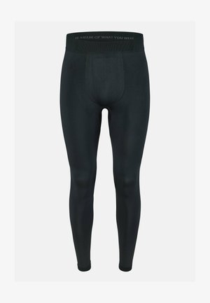 Leggings sportivi negri realizate dintr-un material elastic, cu un design fitted, talie lată și accente texturate subtil pe picioare.