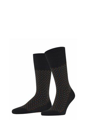 Paar schwarze Socken bis Mitte der Wade mit kleinen orangefarbenen und grauen geometrischen Mustern und durchgehend schwarzen Bündchen, Fersen und Zehen.