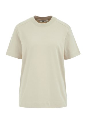 Beige bomull t-shirt med rund halsringning, korta ärmar och en avslappnad passform. Har platta sömmar och inga synliga logotyper eller mönster.