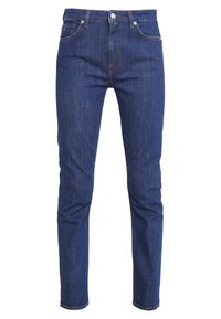 Tmavě modré džínové kalhoty s úzkým střihem, které mají pět kapes, zlaté prošívání, zapínání na knoflík vpředu a hladký povrch.