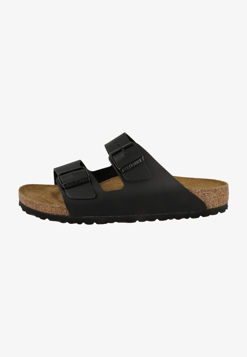 Black two-strap sandal with adjustable buckles, cork footbed, and textured rubber outsole. Smooth synthetic upper.