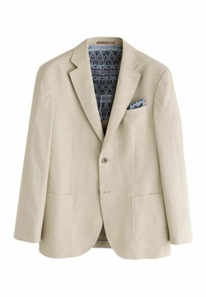 Beige blazer med to forlommer, enkelt knap, mønstret blå og sort for, og matchende mønstret lommetørklæde.