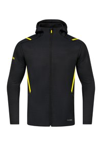 Zwarte hoodie met ritssluiting en hoge kraag, voorzien van gele accenten op de schouders en zijkanten. Gemaakt van een gestructureerde stof.