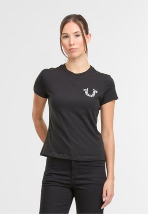 Black cotton t-shirt with short sleeves, round neckline, and a white graphic logo on the left chest. Smooth texture, fitted silhouette.