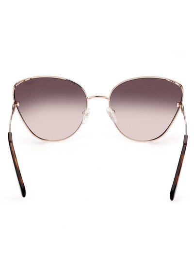 Gafas de sol estilo cat-eye con un tinte gris degradado, marco de metal, almohadillas nasales transparentes y brazos con patrón de carey.