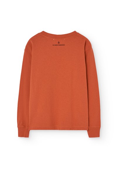T-shirt arancione a maniche lunghe in cotone, con colletto rotondo e dettaglio del logo stampato in nero sulla parte superiore della schiena. Tessuto liscio.