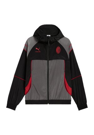 Fekete és szürke cipzáros kapucnis pulóver piros AC Milan logóval, Puma emblémával, piros díszítésekkel, rugalmas mandzsettákkal és elülső cipzáras zsebekkel.