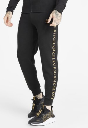 DYNAMIC - Trainingsbroek - black