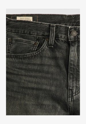 Dunkelgraue Denim-Jeans mit leicht verblasster Textur, klassischem Fünf-Taschen-Design, Knopfverschluss und sichtbaren Nähten.