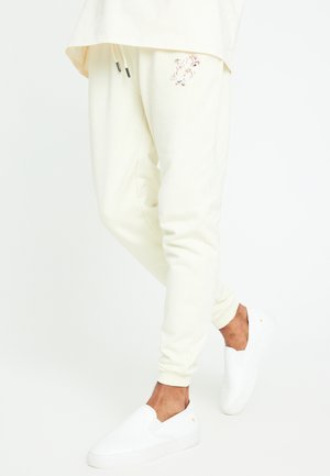 Pantalones deportivos - ecru