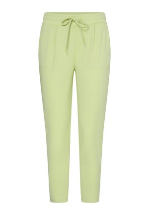 Pantalon vert clair fuselé avec une ceinture élastique et un cordon de serrage à l'avant, présentant des plis subtils à l'avant et un ourlet à la cheville.