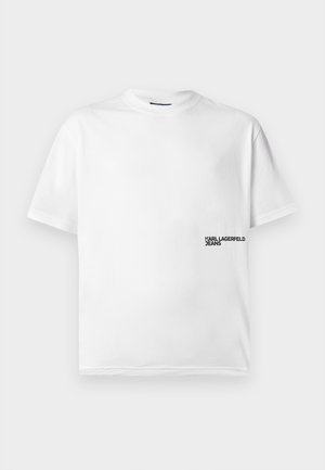 Bijela pamučna majica kratkih rukava, okruglog izreza, s crnim tiskanim logotipom "KARL LAGERFELD JEANS" na donjoj lijevoj strani.