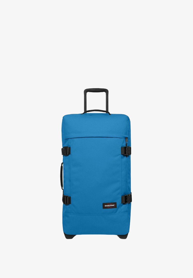 Rollkoffer aus leuchtend blauer Stoff, mit einem ausziehbaren Griff, zwei seitlichen Schnallen und einer vorderen Reißverschlusstasche für zusätzlichen Stauraum.