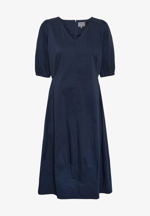 Tengerészkék ruha V-kivágással, rövid puffos ujjak és bővülő szoknya. Simító anyagból készült, hátul cipzárral és varrás nélküli kialakítással.