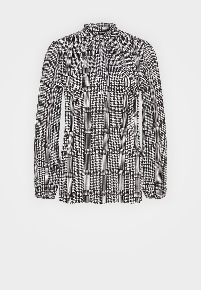 Czarna i biała koszula w kratę z długim rękawem, z falbaniastym dekoltem i detalem w postaci wiązania. Tkanina ma miękką teksturę z wzorzystym designem.