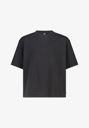 Zwarte T-shirt met korte mouwen en een ronde hals, losse pasvorm en zichtbare stiksels langs de mouwen, kraag en zoom.