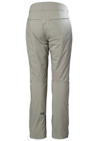 Pantalones exteriores de color gris claro con una textura suave, cinturilla ajustable y ventilaciones con cremallera en los tobillos. Presenta bolsillos traseros ocultos.
