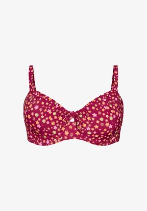 Punainen kukallinen rintaliivit, joissa pieniä monivärisiä kukkia, kaaritukikupit, säädettävät olkaimet ja pieni etuosan rusetti leikkauksella.