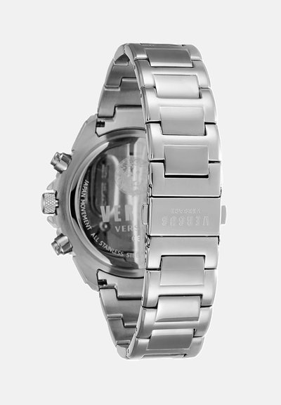 Orologio in acciaio inossidabile con una cassa tonda elegante e un bracciale spesso con maglie collegate. Il retro presenta un logo di leone e incisioni.