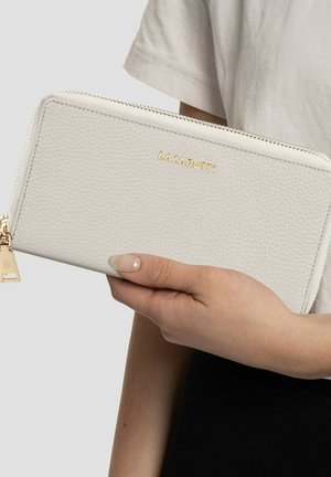 White leather wallet with textured surface, gold "LAZAROTTI" logo, zipper closure, and small gold triangle charm.