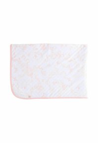 Cotton blanket with a white base and light pink swirling floral pattern. Finished with pink binding along the edges. Soft texture.