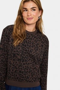 Sweatshirt marron avec motif léopard noir, design col rond et poignets côtelés. Tissu doux avec une coupe décontractée, adapté pour un look décontracté.
