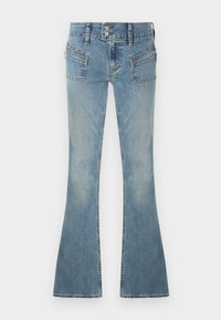 Lyseblå vide jeans laget av denim, med to knapper foran, synlige sømmer og baklommer med subtil falming.