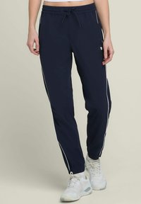 Wilson ACTION WARM-UP - Jogginghose - dunkelblau
