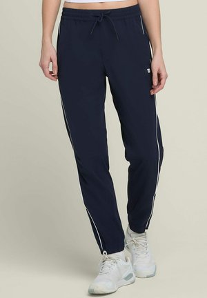 ACTION WARM-UP - Tracksuit bottoms - dunkelblau