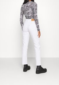 Levi's® Jeans slim fit - white denim