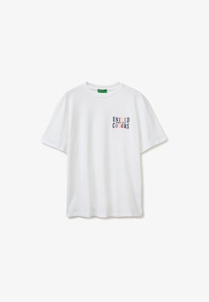 Maglietta bianca a maniche corte con scritta multicolore "United Colors Since 1965" sul petto sinistro.