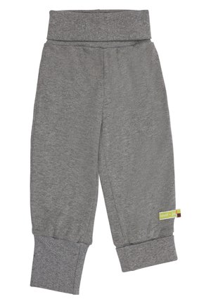 Graue Sweatpants mit einem breiten, elastischen Bund und gerippten Bündchen an den Knöcheln. Hergestellt aus weichem Material und mit einem kleinen Markenetikett an der Seite.