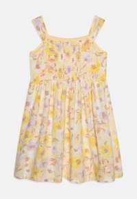 Φλοράλ καλοκαιρινό φόρεμα με κίτρινο φόντο, που διαθέτει παστέλ λουλούδια σε ροζ, μωβ και πορτοκαλί. Σμιλευμένο μπούστο και λεπτές τιράντες.