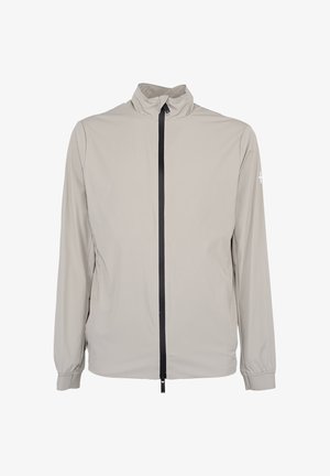 Lichtgrijze windjack met hoge kraag, zwarte ritssluiting over de volle lengte aan de voorkant, elastische boorden en subtiel logo op de linkermouw.