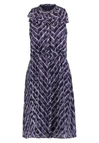 Bezrukávové šaty do délky kolen s fialovo-bílým vzorem ve tvaru šípů, s volánkovým límcem a předním zapínáním na knoflíky.