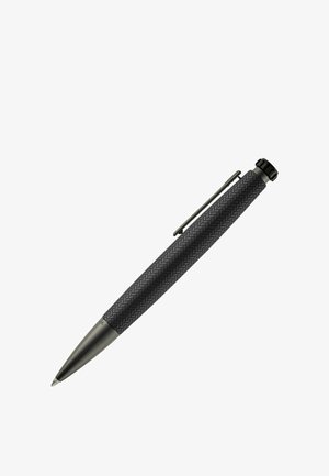 Black retractable ballpoint pen with textured grip and metal clip angled on white background.