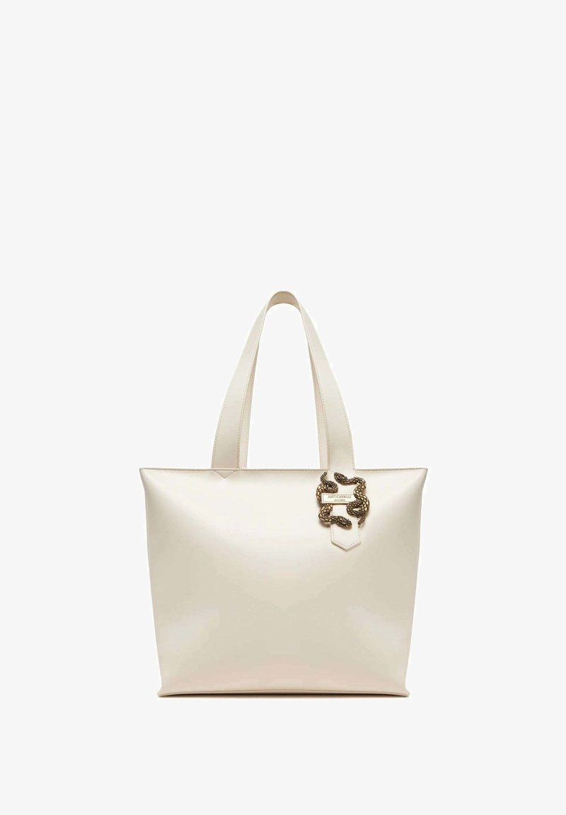 Borsa tote color crema realizzata in materiale liscio, con un distintivo accento in metallo dorato a forma di serpente e due manici robusti.