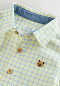Unselected, yellow gingham character