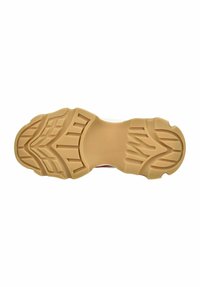 Footwear outsole with a textured, rubber surface in beige. Features a pronounced tread pattern with grooves for traction.